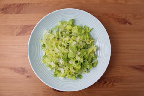 Sheet Pan Crispy Cod Sandwiches - Step #5 Dress the lettuce