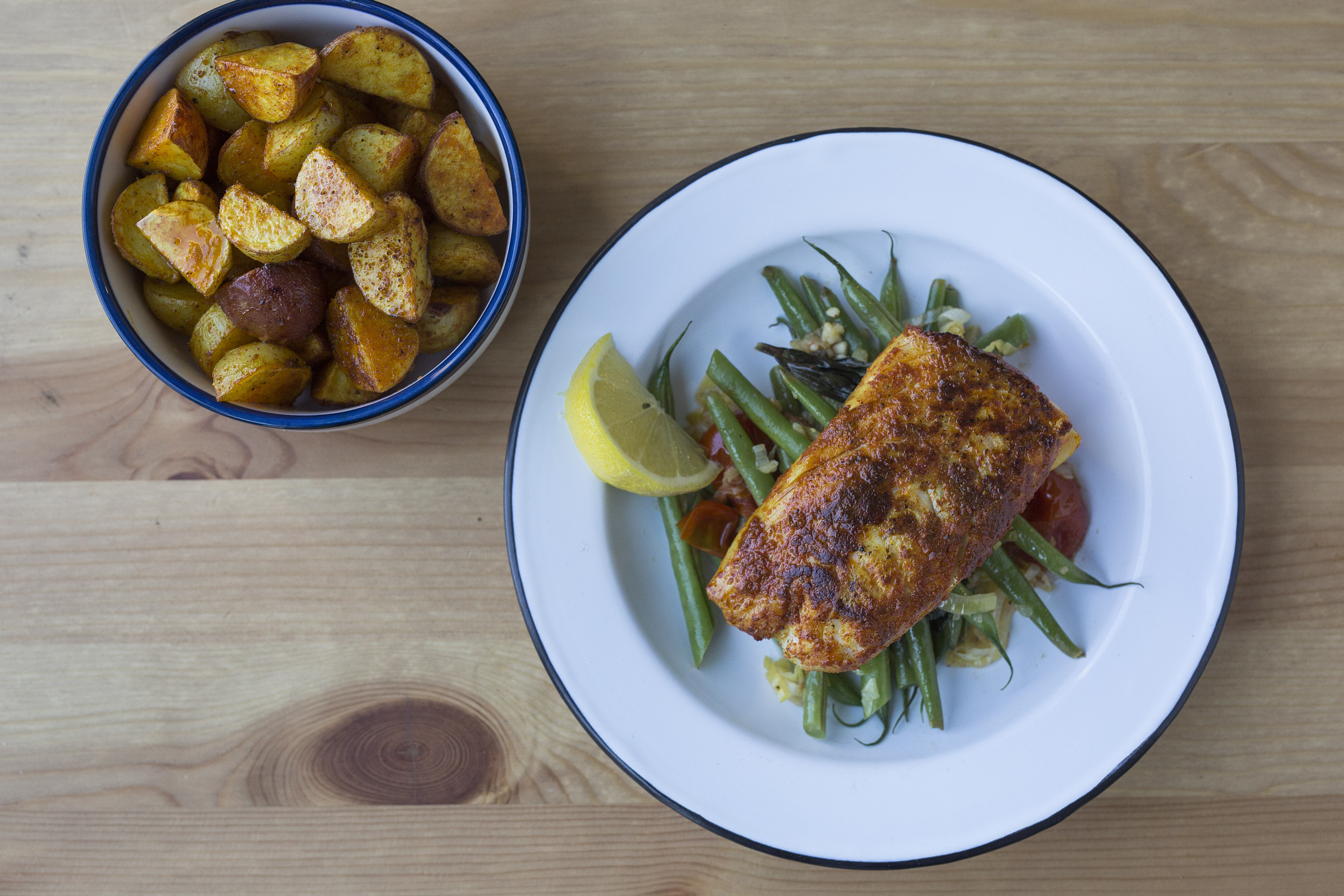 Spanish Haddock over Green Bean & Tomato Sauté with Smoky Roasted
