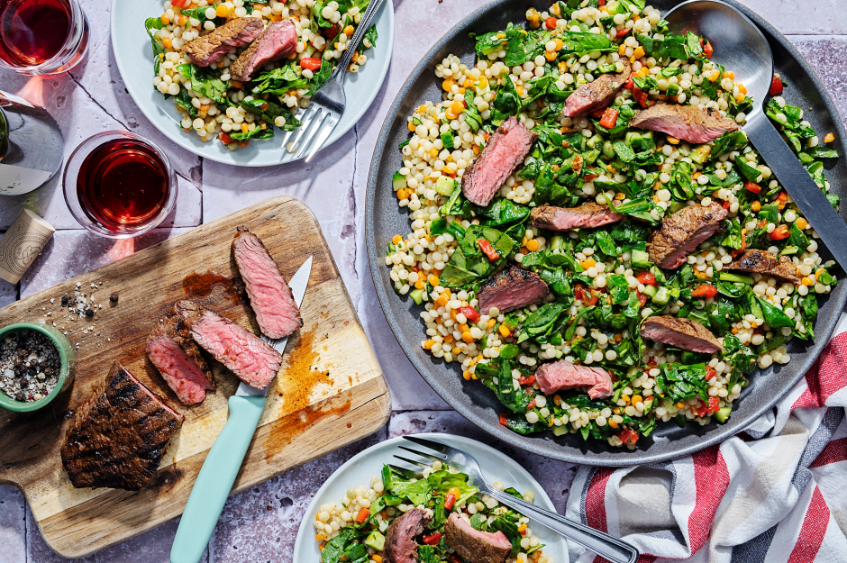 Grilled Steaks over Pearl Couscous Salad
