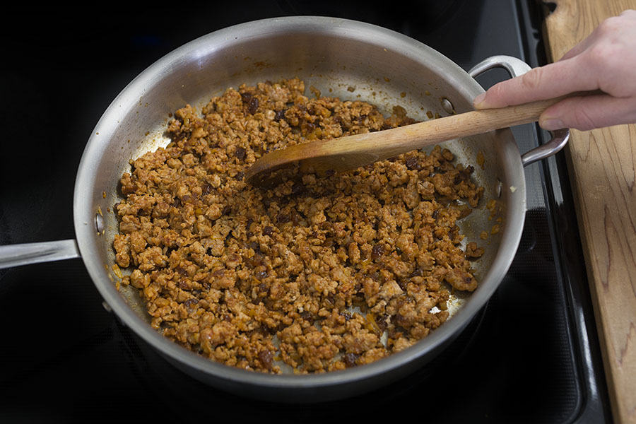 Baked Chilean Pork Empanadas with Mixed Greens & Spiced Pepitas